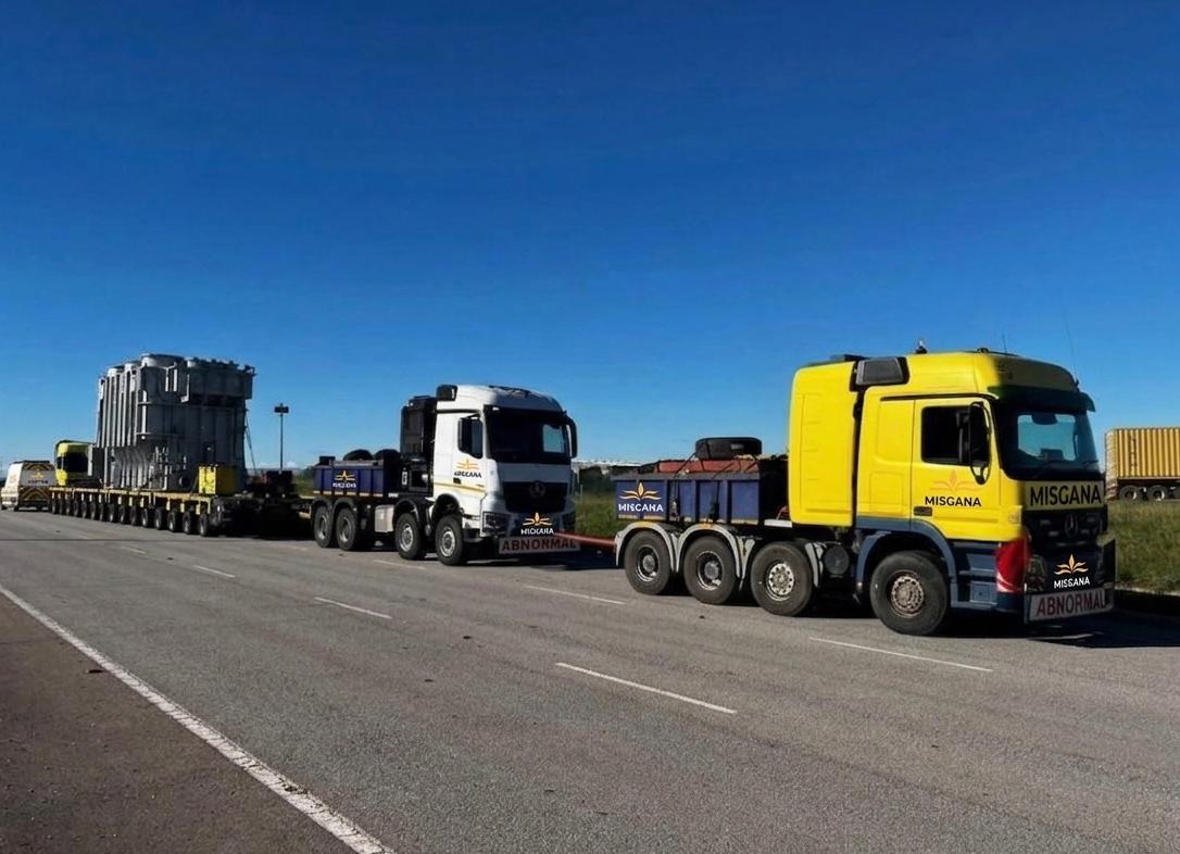 MISGANA transporting road compactor roller on lowbed trailer